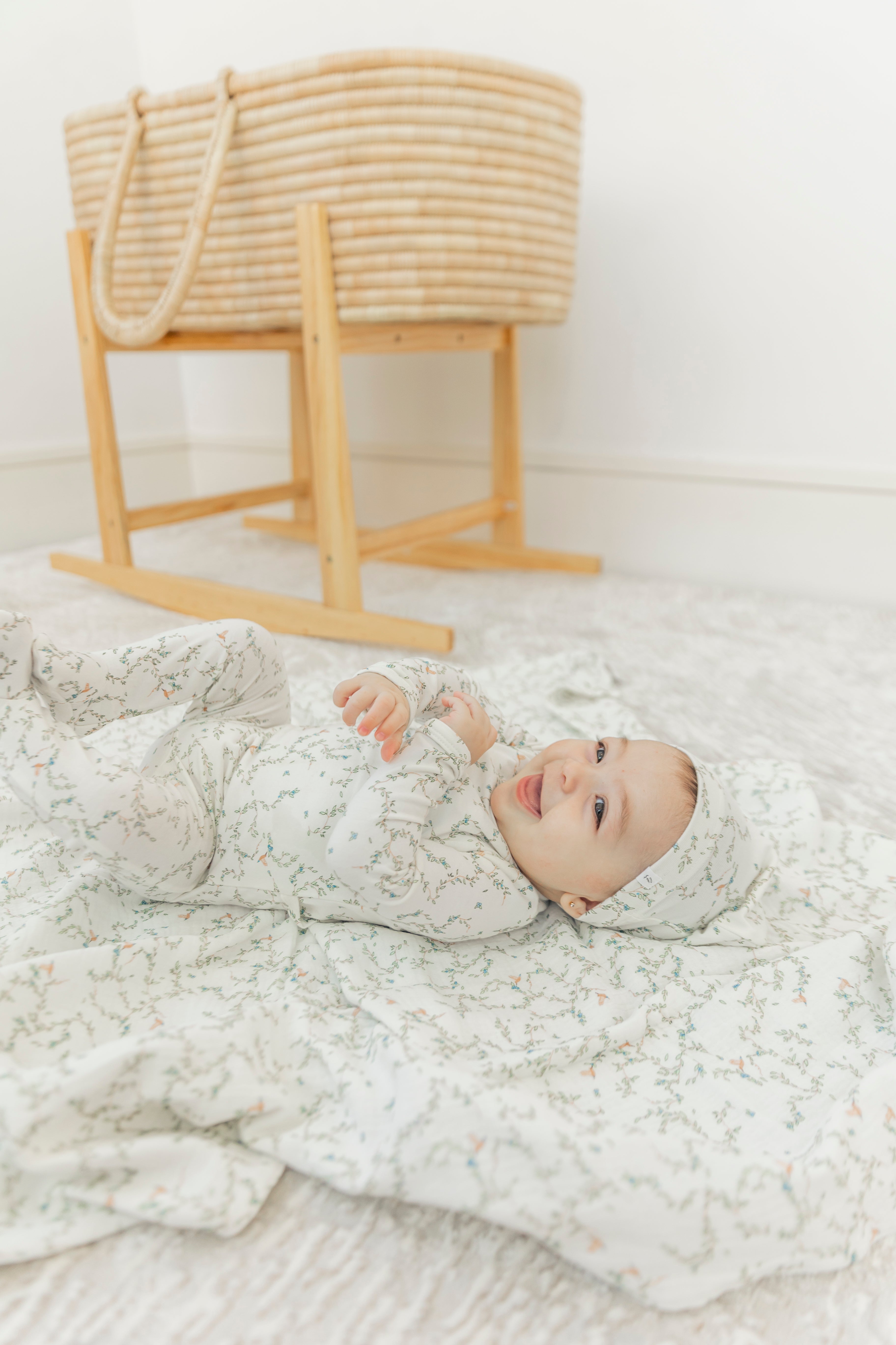 Leaves and Bird Print Swaddle in by Little Fragile