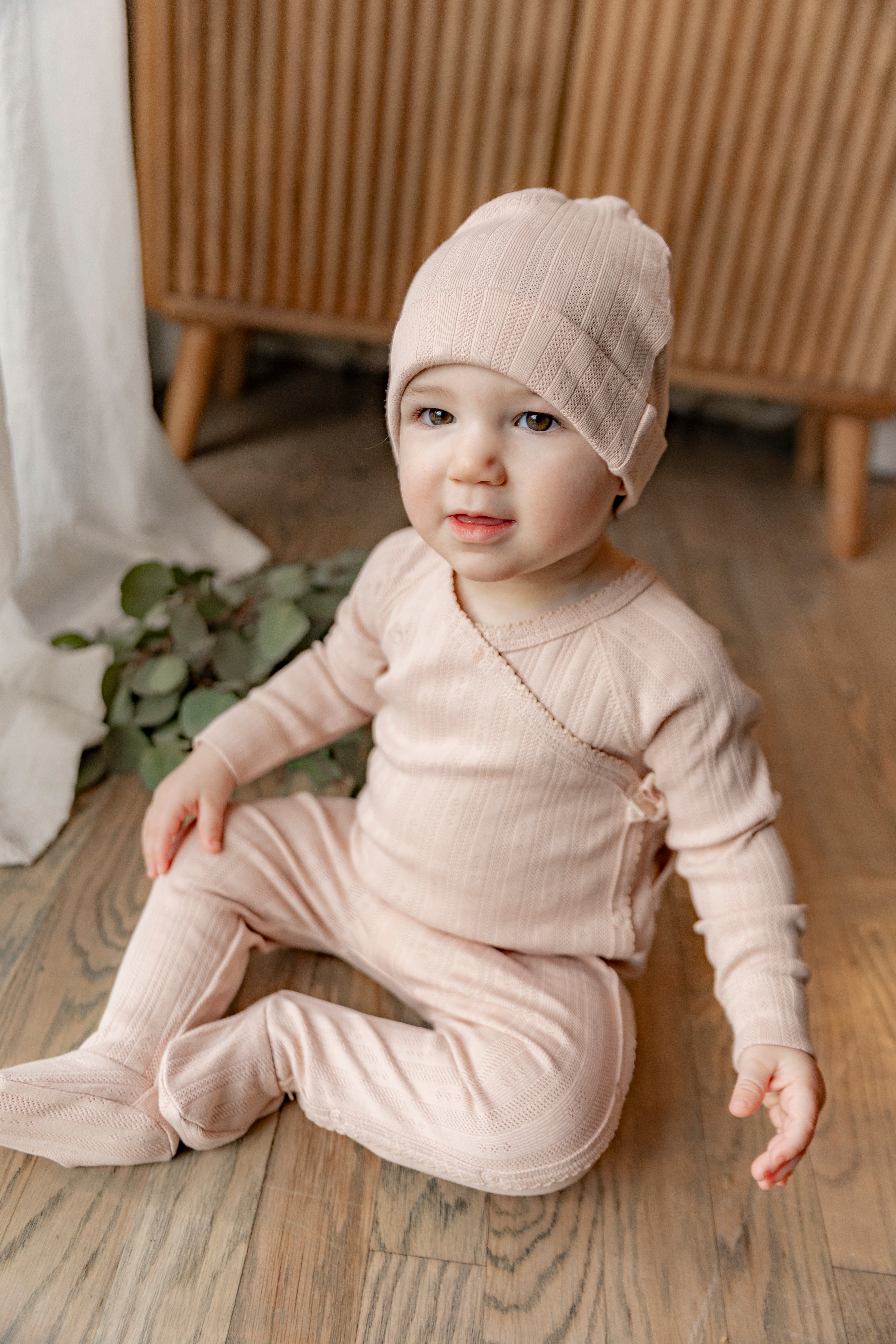 Pointelle Rib Wrap Onesie and Hat in White by Bebe Bella