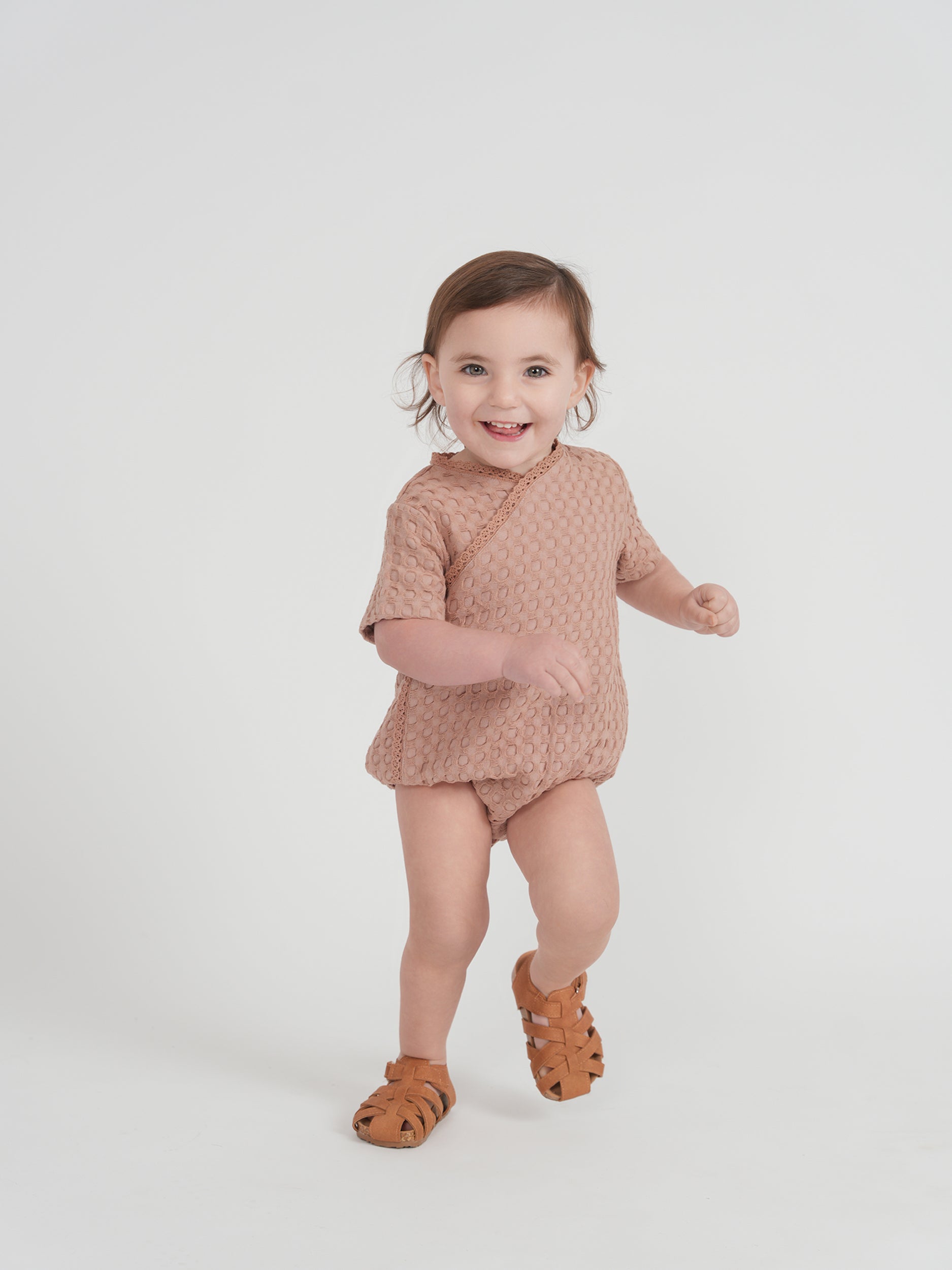 Textured Waffle Romper in by Little Fragile