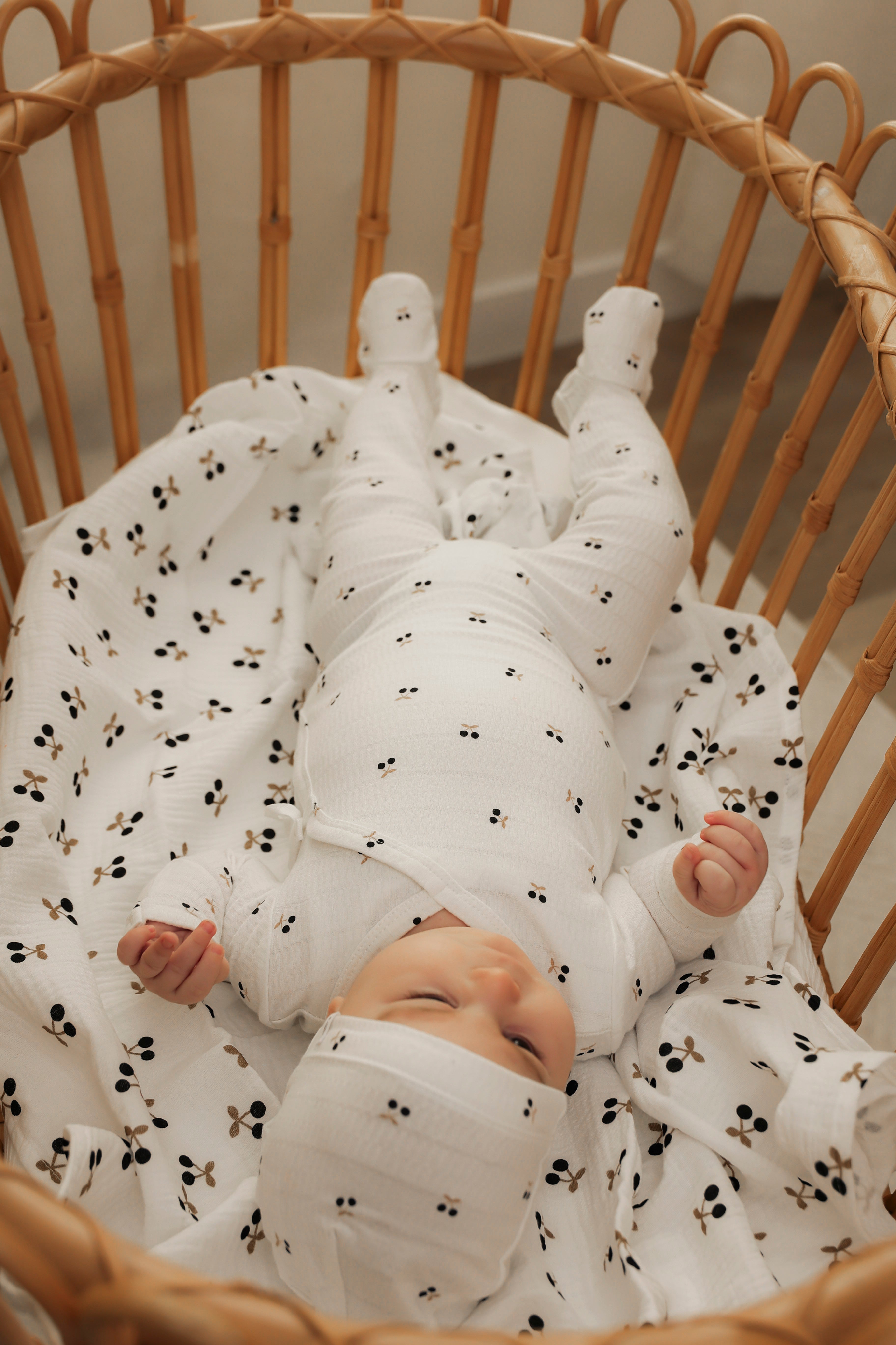 Cherry Print Crinkle Swaddle in by Little Fragile