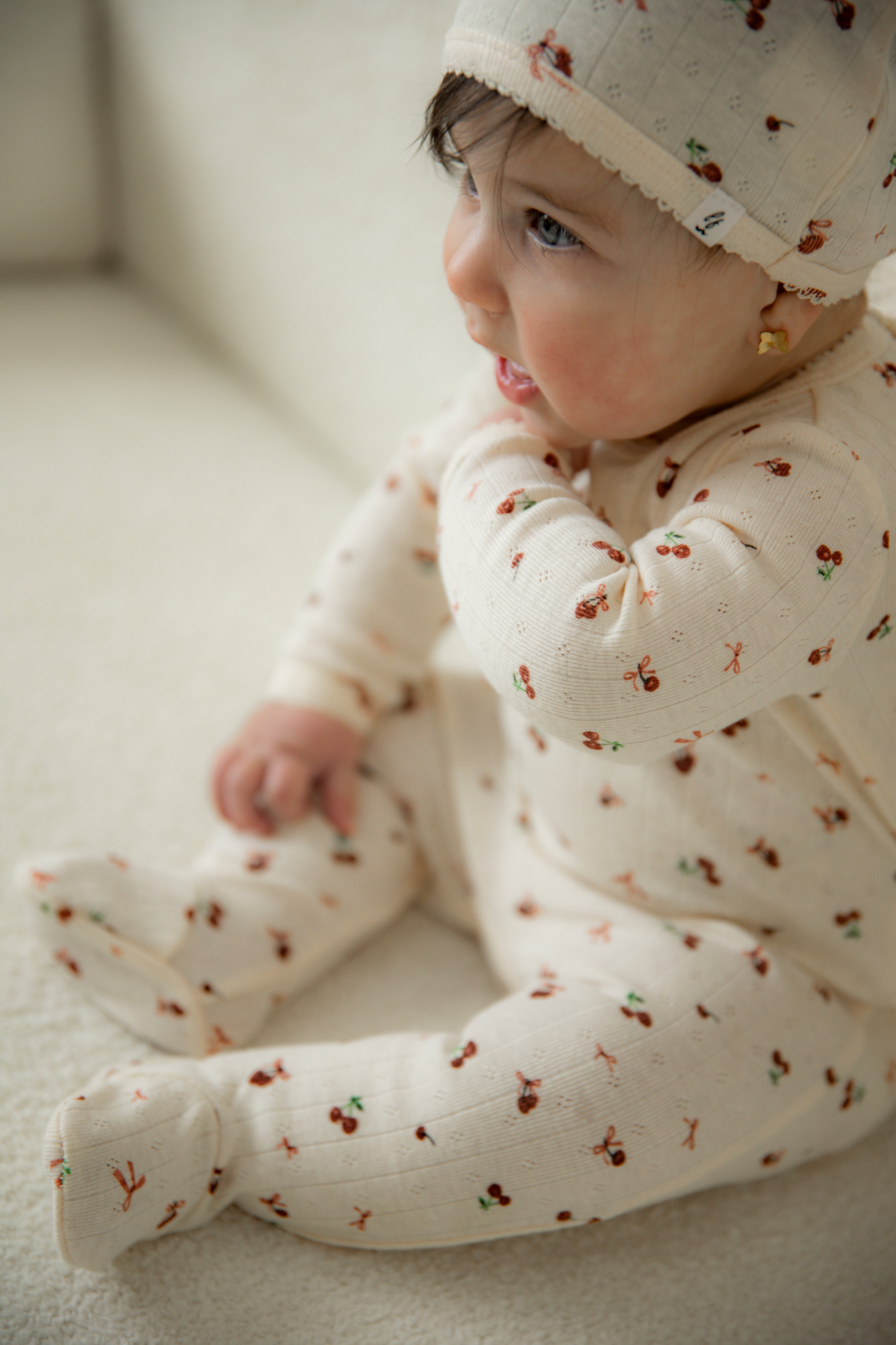 Cherry Pointelle Onesie in by Little Fragile