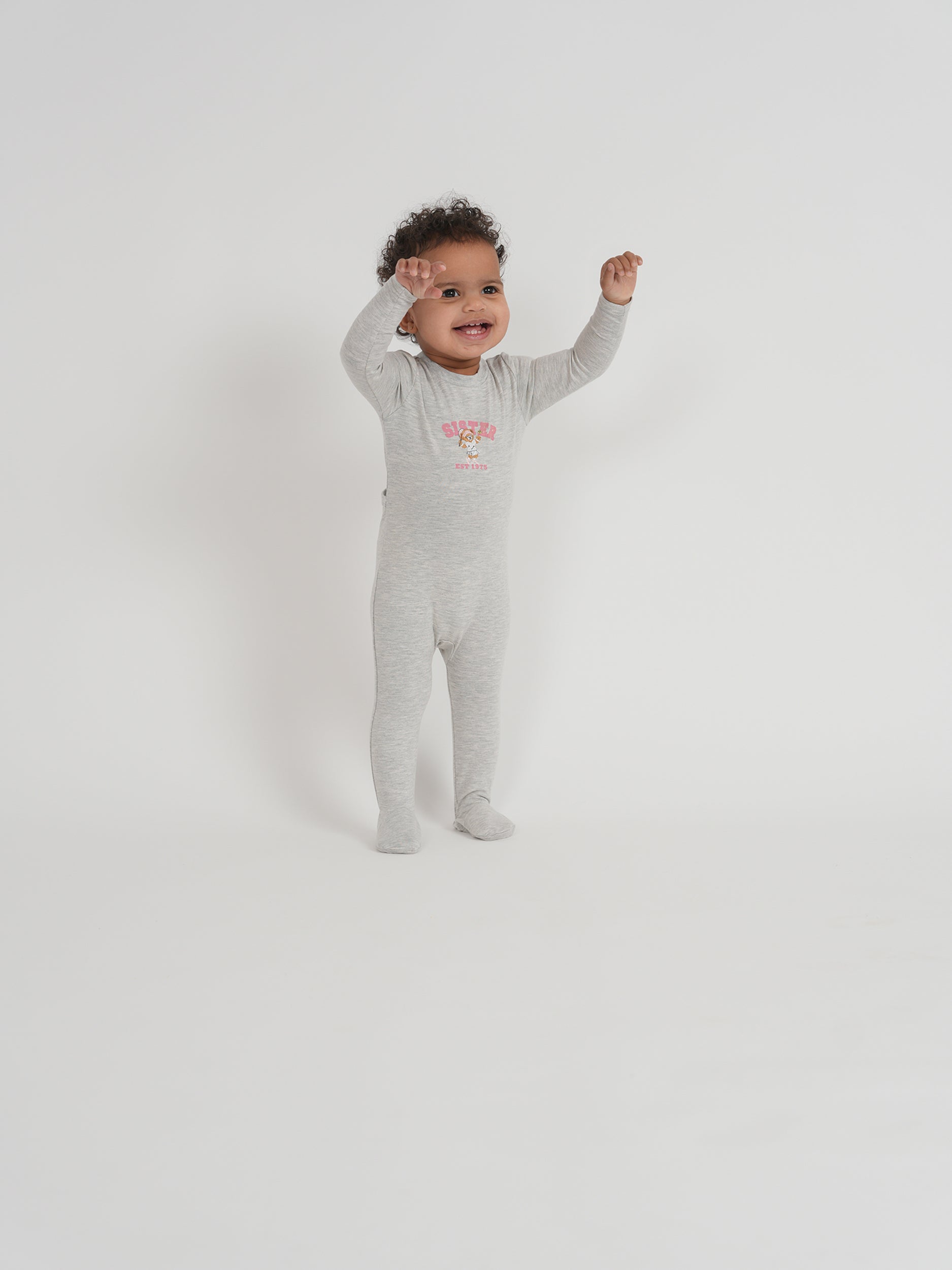 Sister 1975 Onesie in by Whipped Cocoa