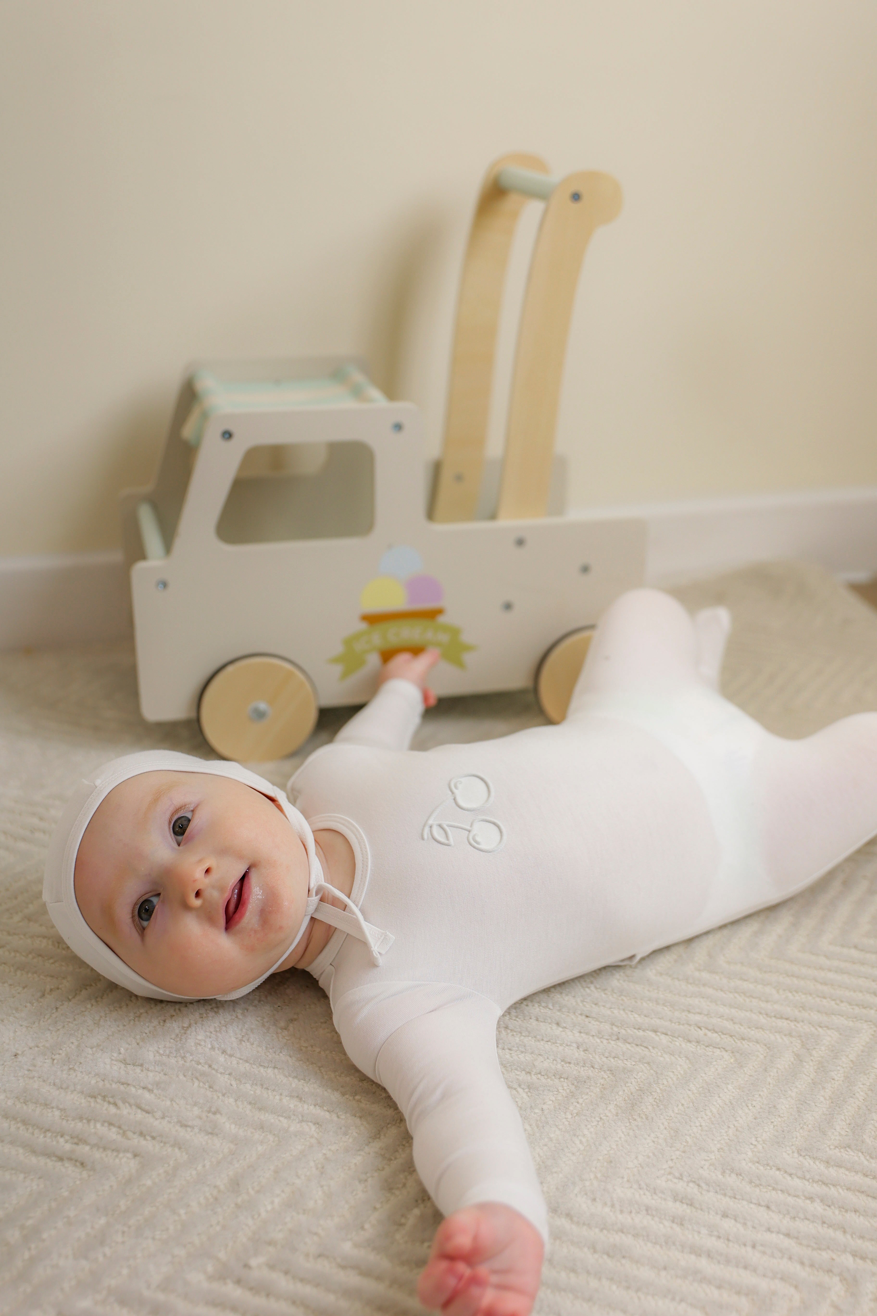 Embossed Cherry Onesie in by Bebe Bella