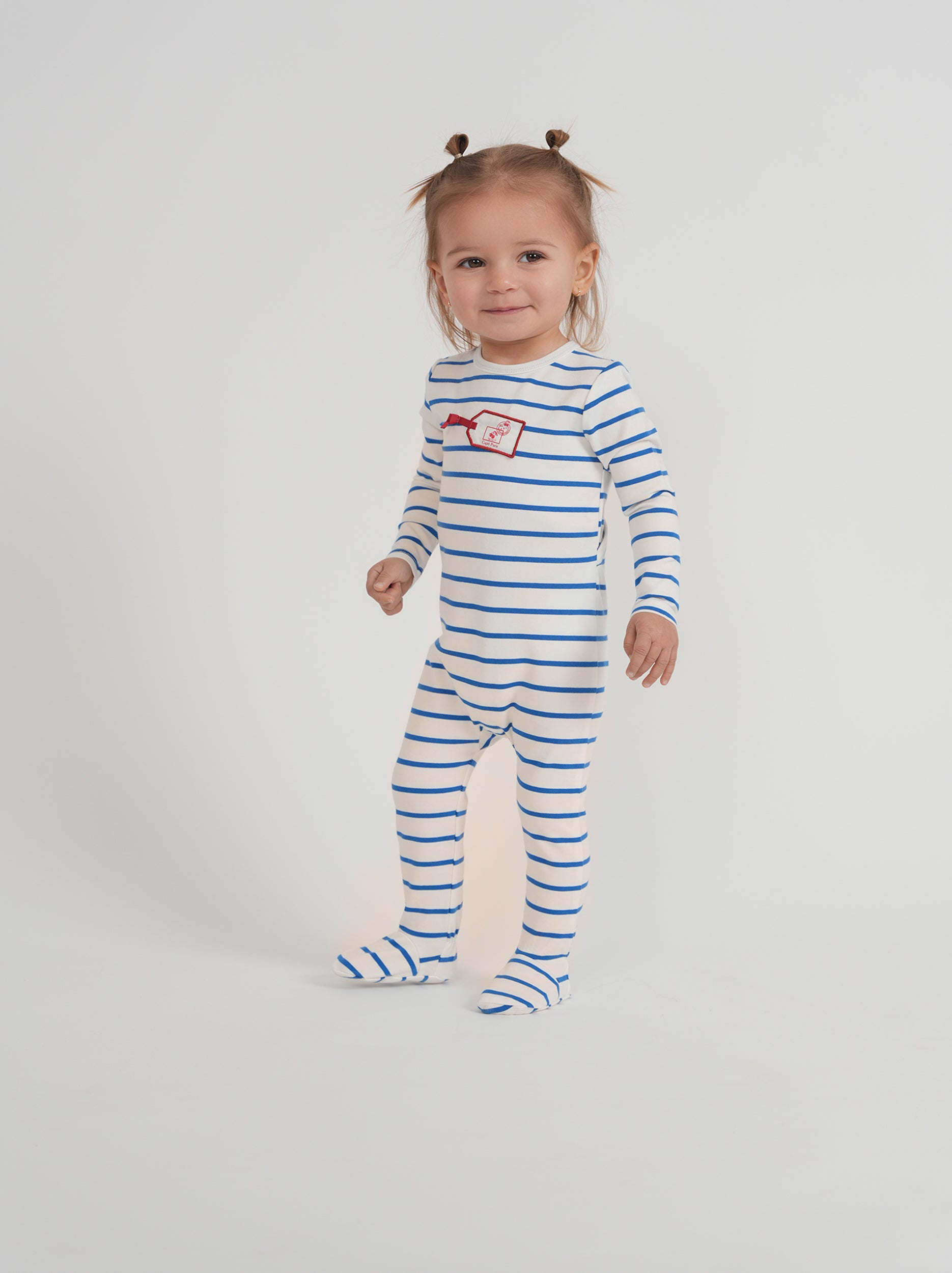 Striped Tag Applique Onesie in by Jolie Capri
