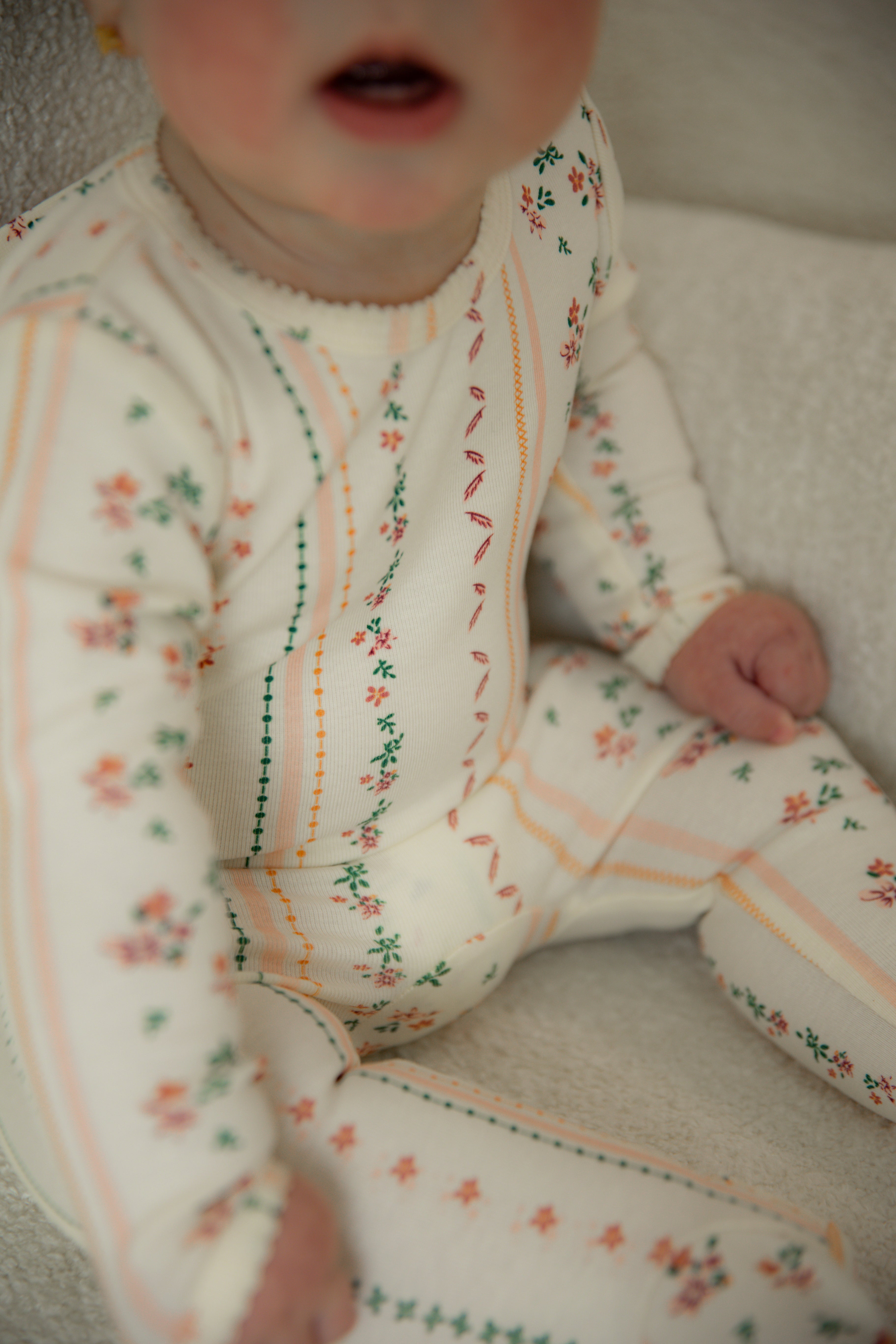 Floral Printed Cotton Onesie in by Puddles