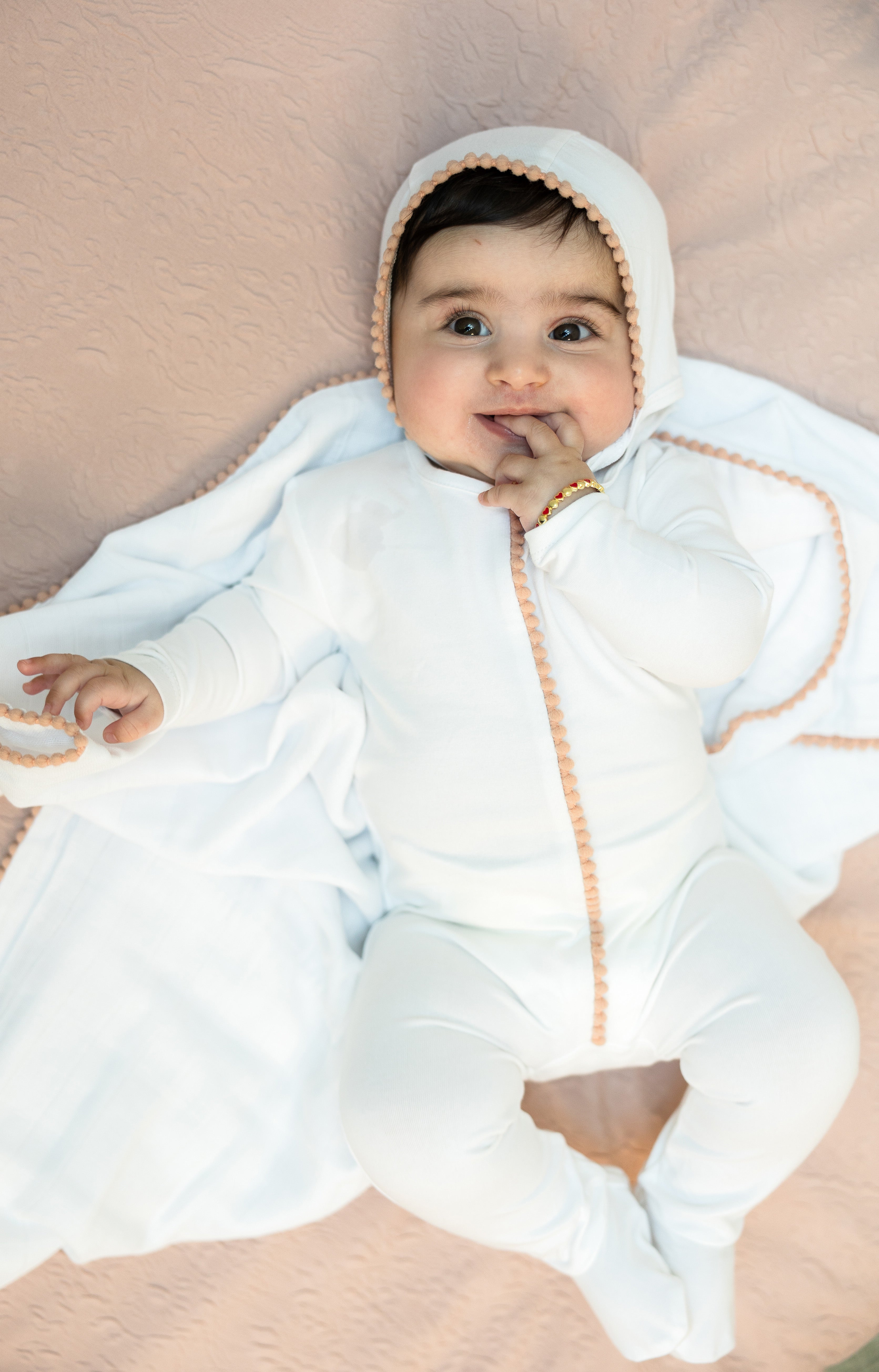 Pom Pom Trim Onesie with Bonnet in by Bebe Bella