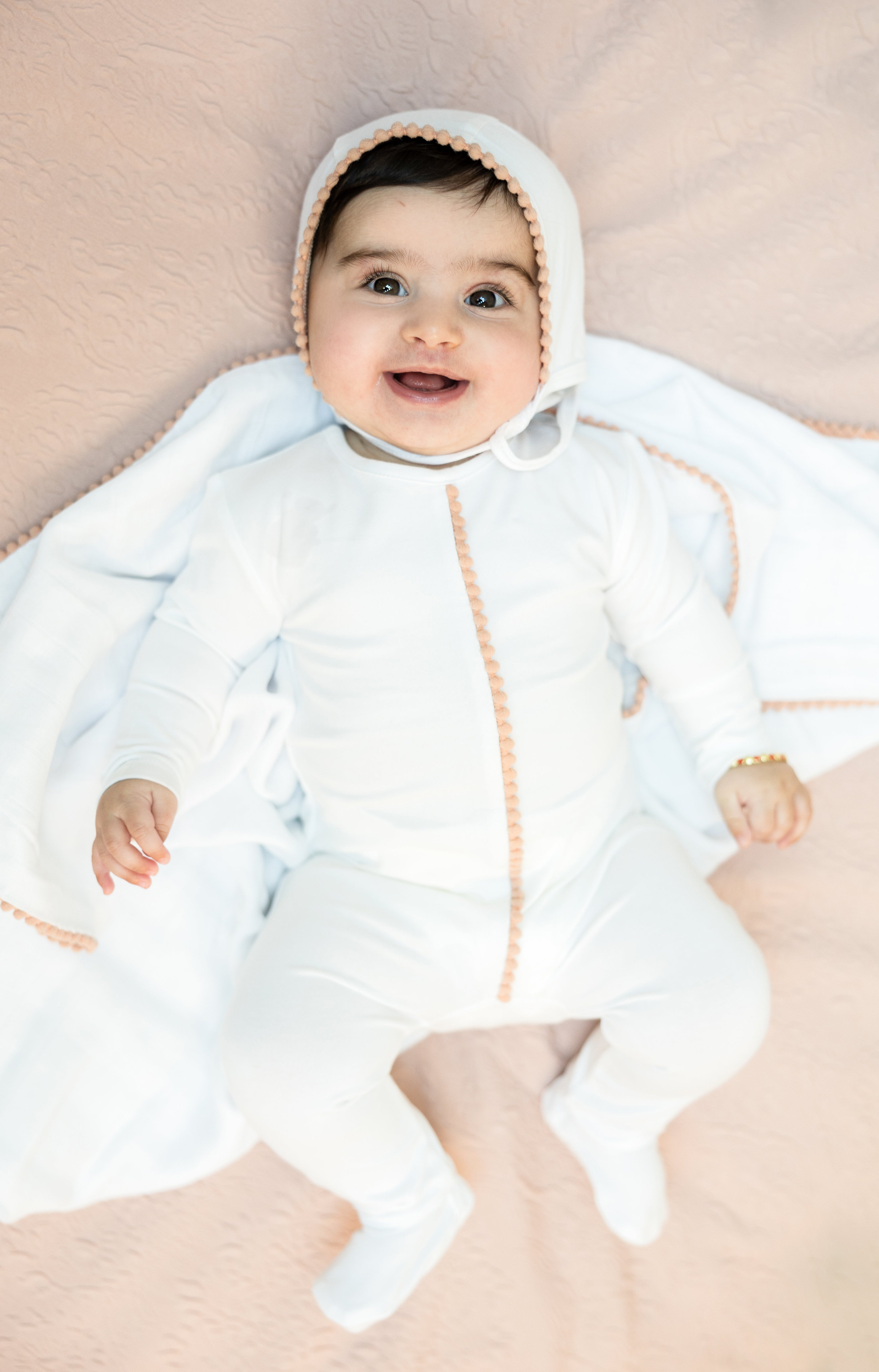 Pom Pom Trim Swaddle in by Bebe Bella