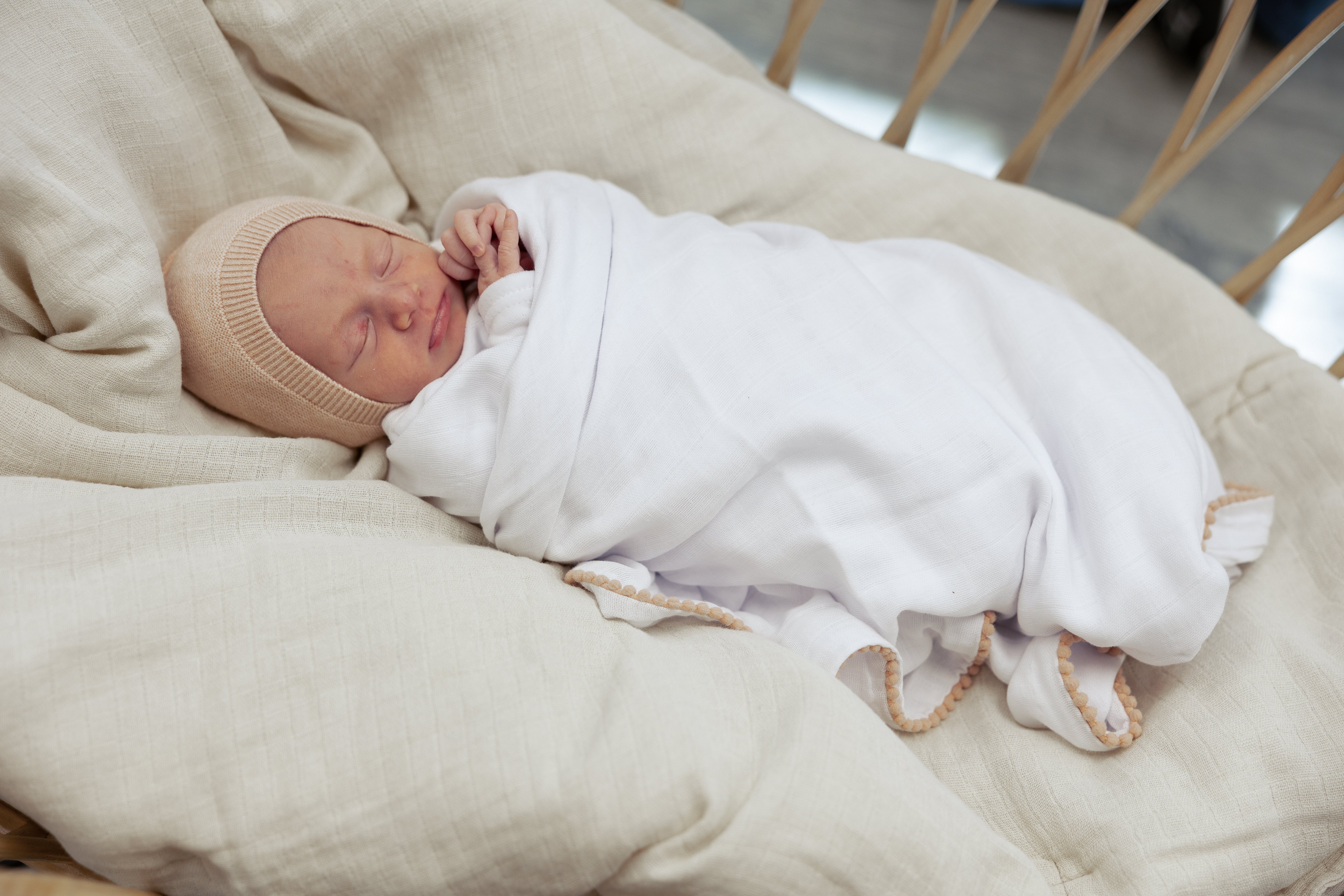 Pom Pom Trim Swaddle in by Bebe Bella