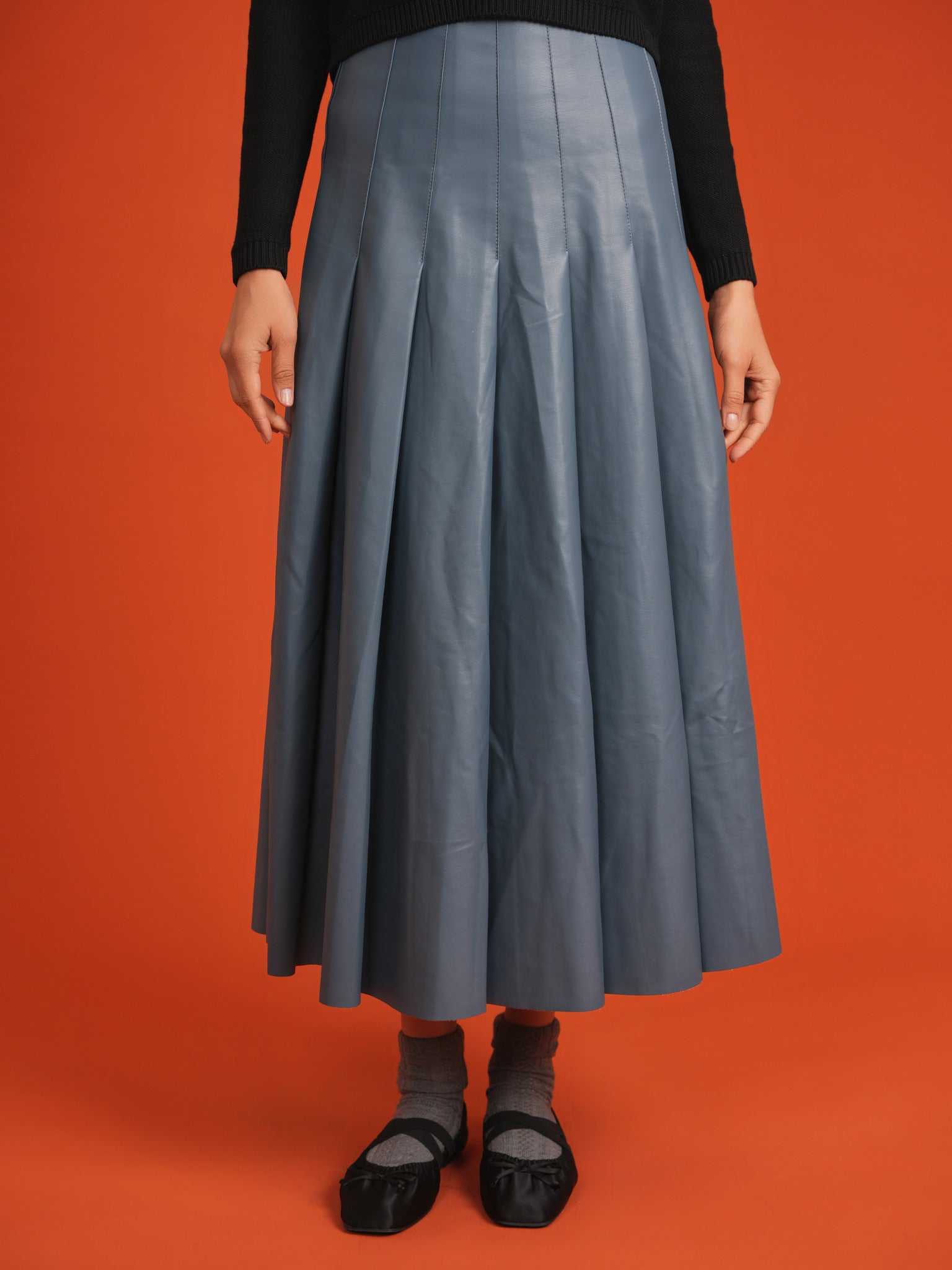 Leather Pleated Midi Skirt in by Noni