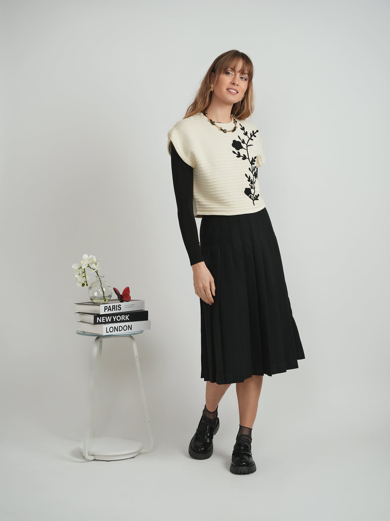 Floral Applique Sweater Vest in by Vivid