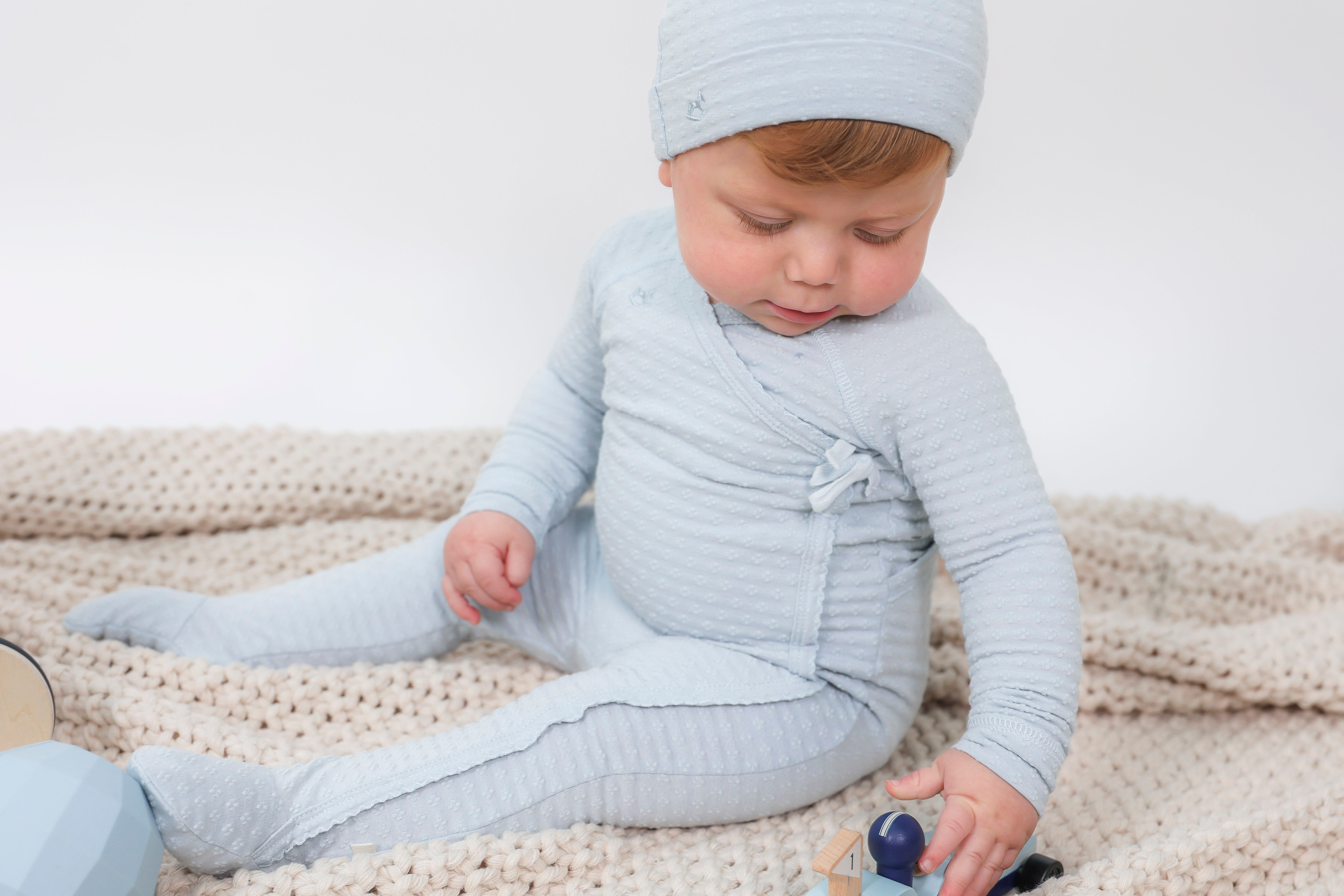 Embossed Diamond Wrap Onesie in Off White by Bebe Bella