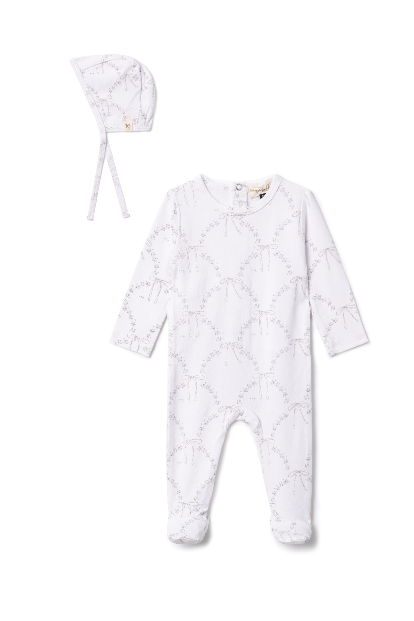 Bow Print Onesie in White by Bebe Bella