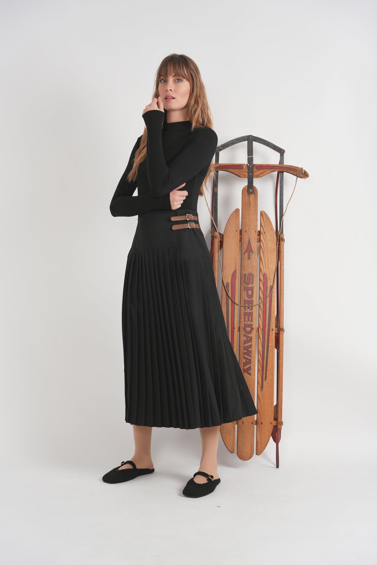 Crepe Pleated Midi Wrap Skirt in Jet Black by Firm Collection