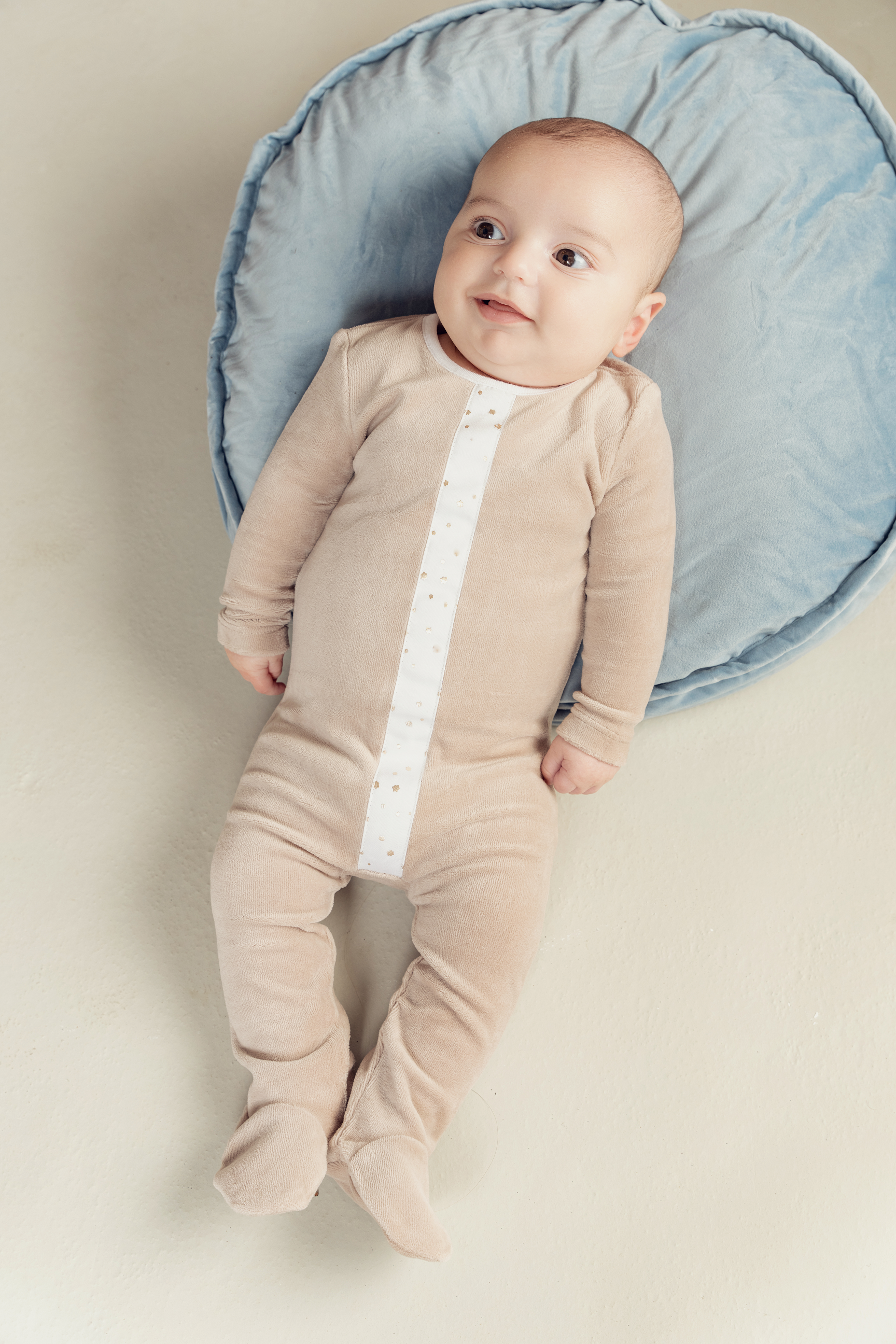 White And Gold Stars Print Velour Onesie in by Fragile